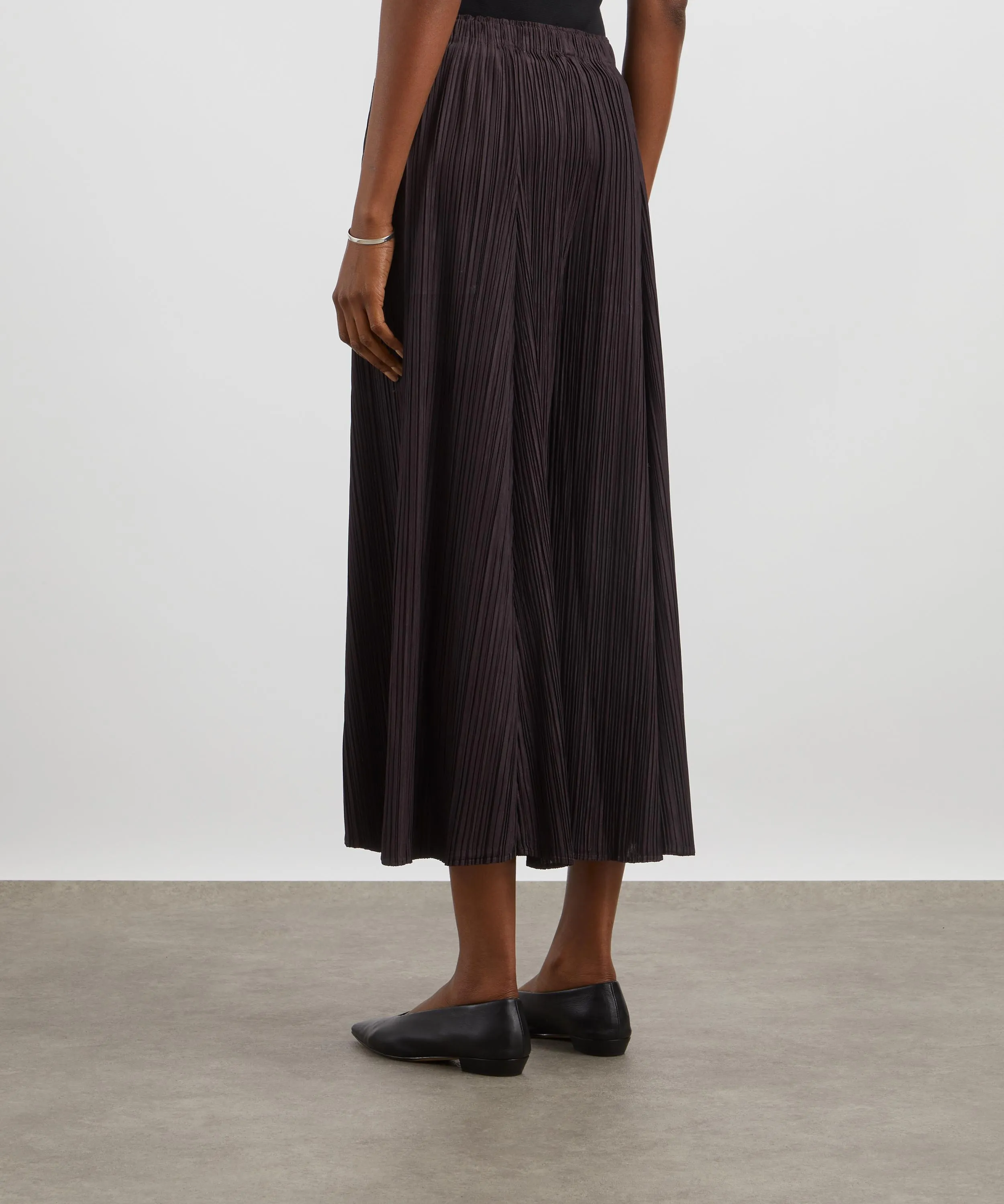 MELLOW PLEATS Pleated Wide-Leg Trousers