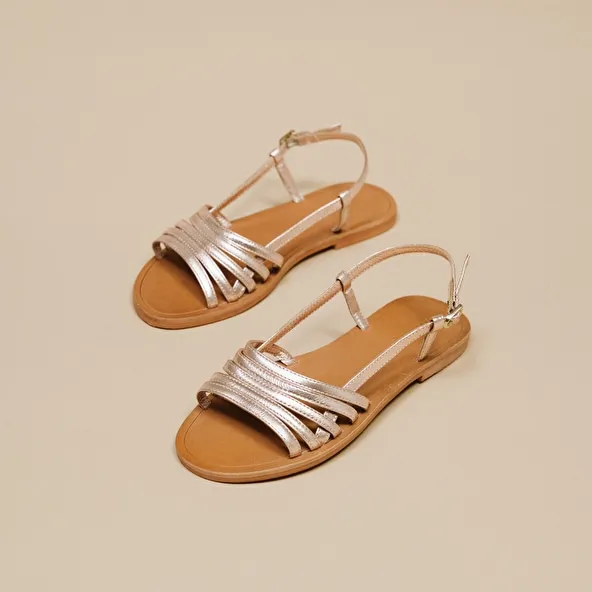 Strappy sandals with open toe in platinum metallized leather